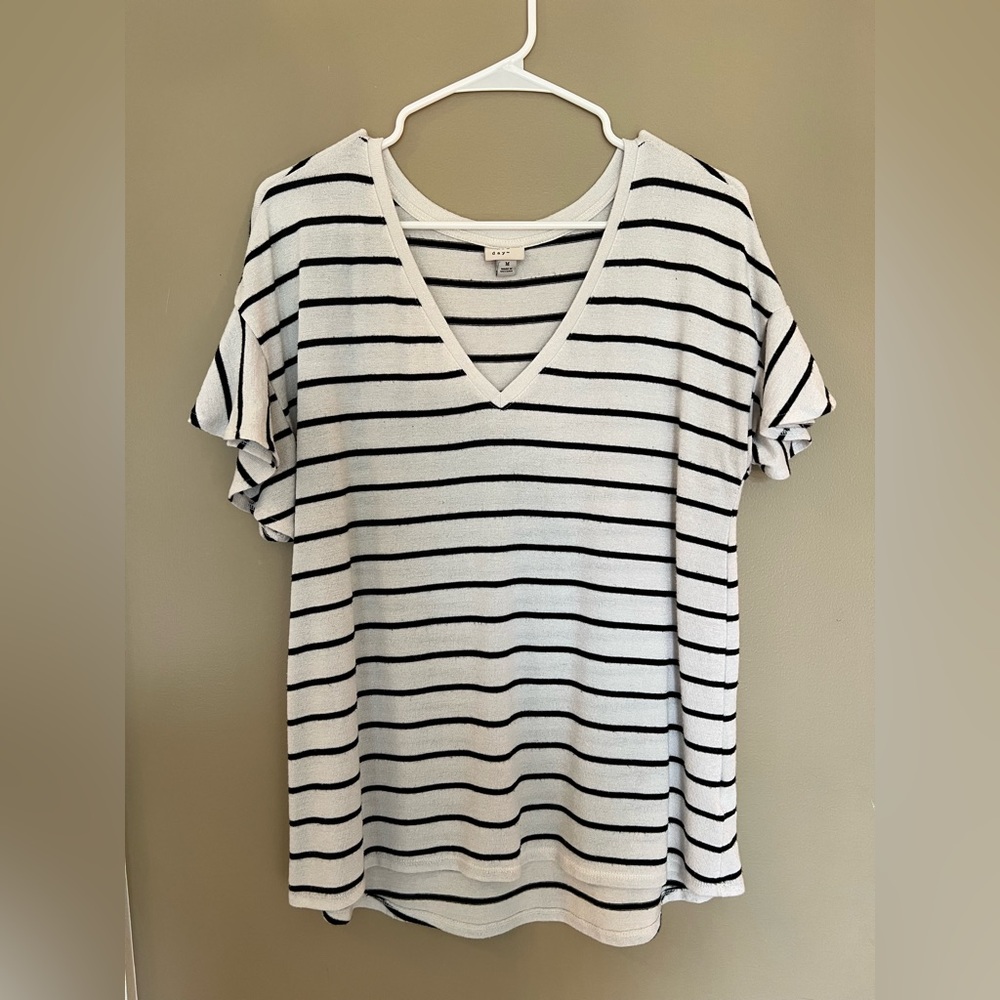 A New Day white and black striped shirt with ruffled sleeves. Size medium.